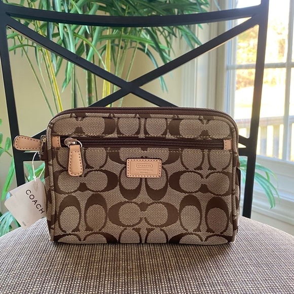 Coach Handbags - 🆕 Coach Signature Canvas Cosmetics Bag